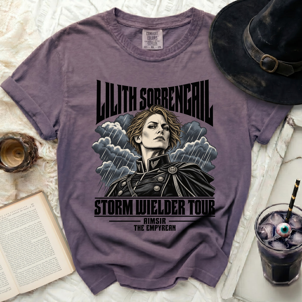 Purple t-shirt with "Lilith Sorrengail Storm Wielder Tour" graphic.