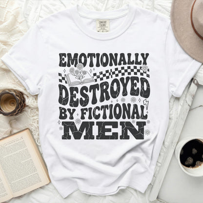 White t-shirt with "EMOTIONALLY DESTROYED BY FICTIONAL MEN" graphic.