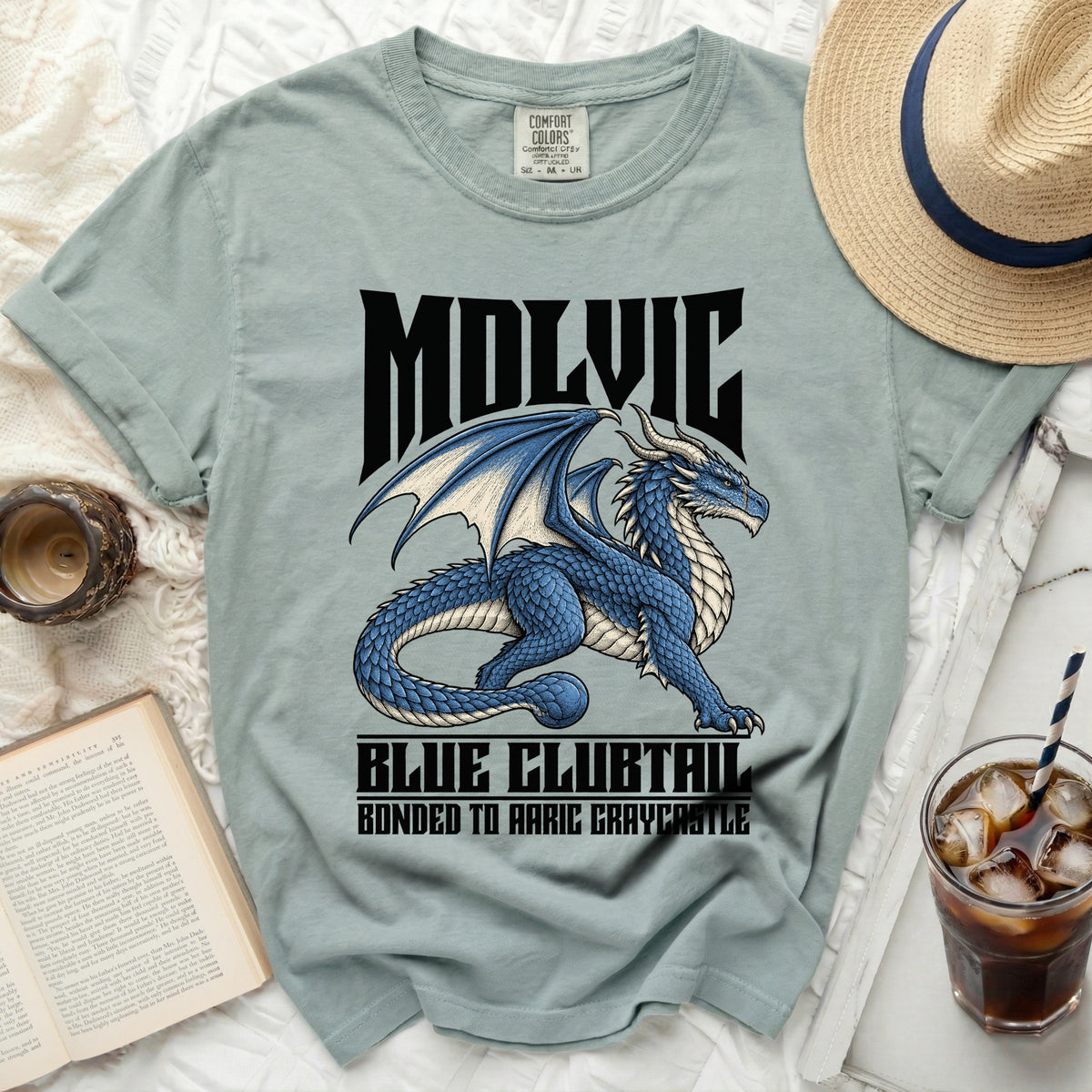 Light blue t-shirt with blue dragon graphic and text "MOLVIC BLUE CLUBTAIL".