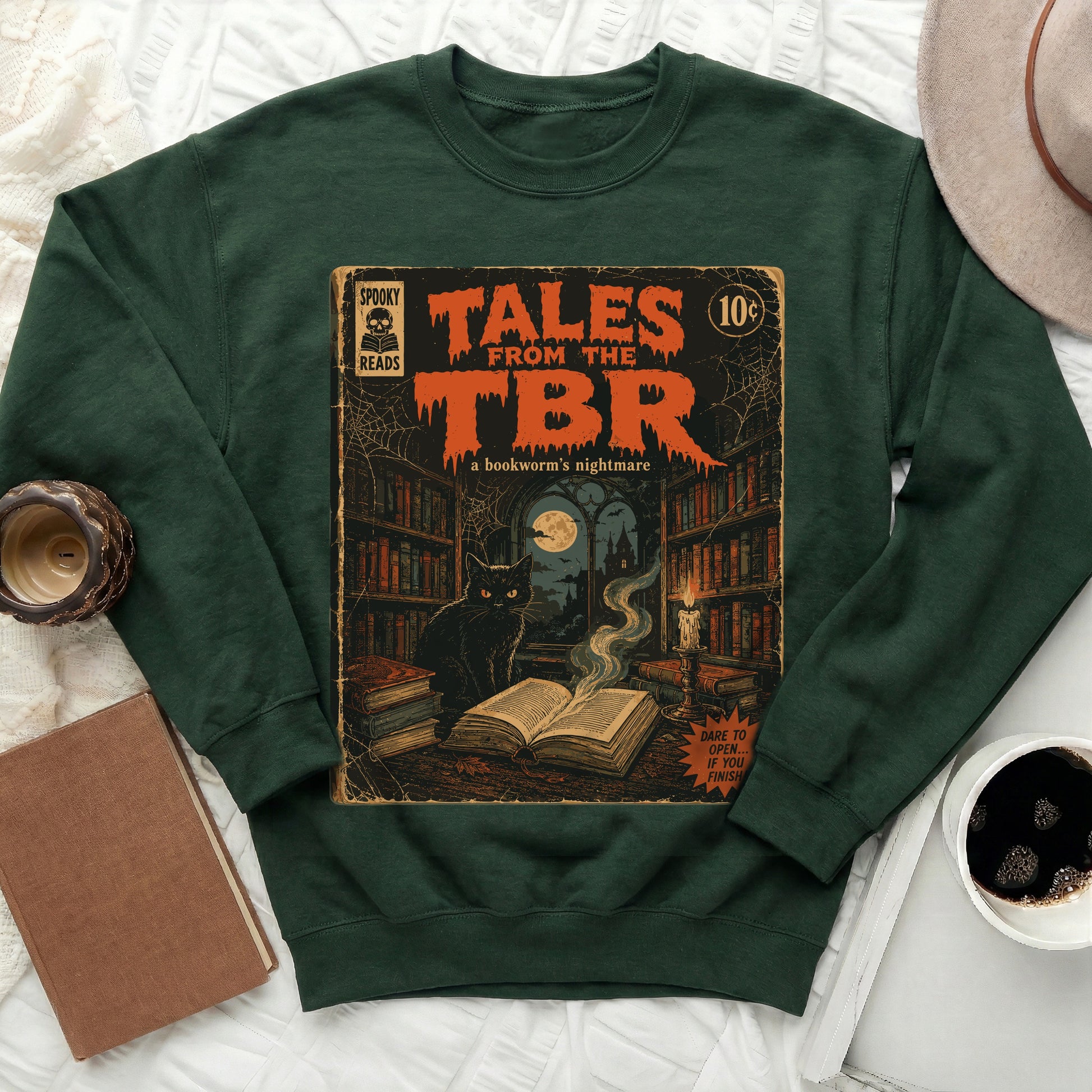 Dark green sweatshirt with a "Tales from the TBR" comic book cover design.
