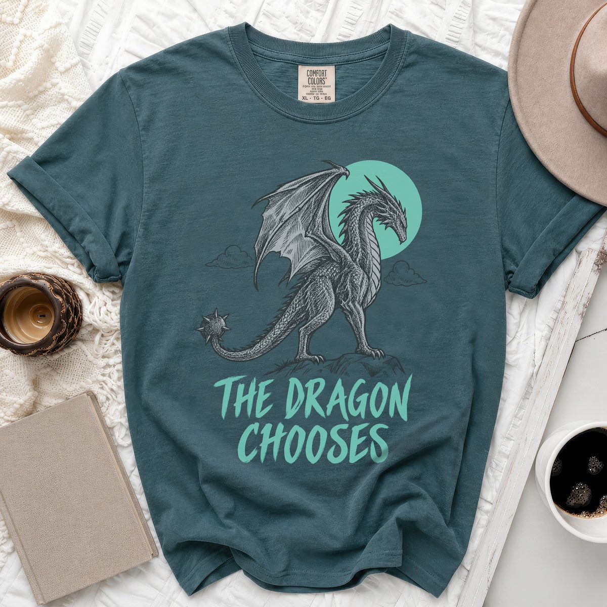 Teal t-shirt with dragon graphic and text "The Dragon Chooses".