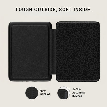 Black case open, showcasing textured exterior and leopard print interior.
