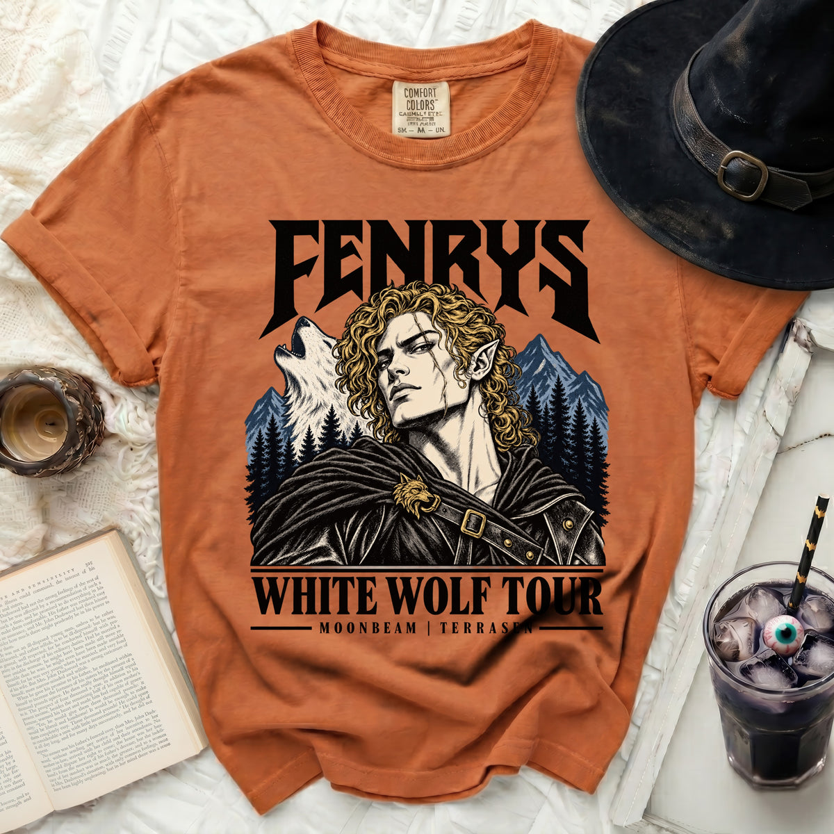 Orange t-shirt with Fenrys White Wolf Tour graphic, wolf, and mountains.