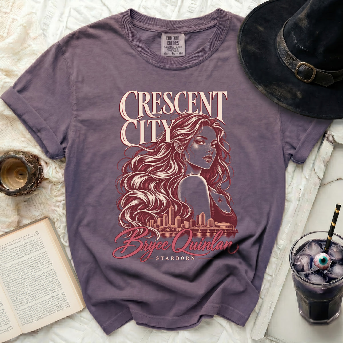Purple t-shirt with Crescent City, Bryce Quinlan, Starborn graphic.