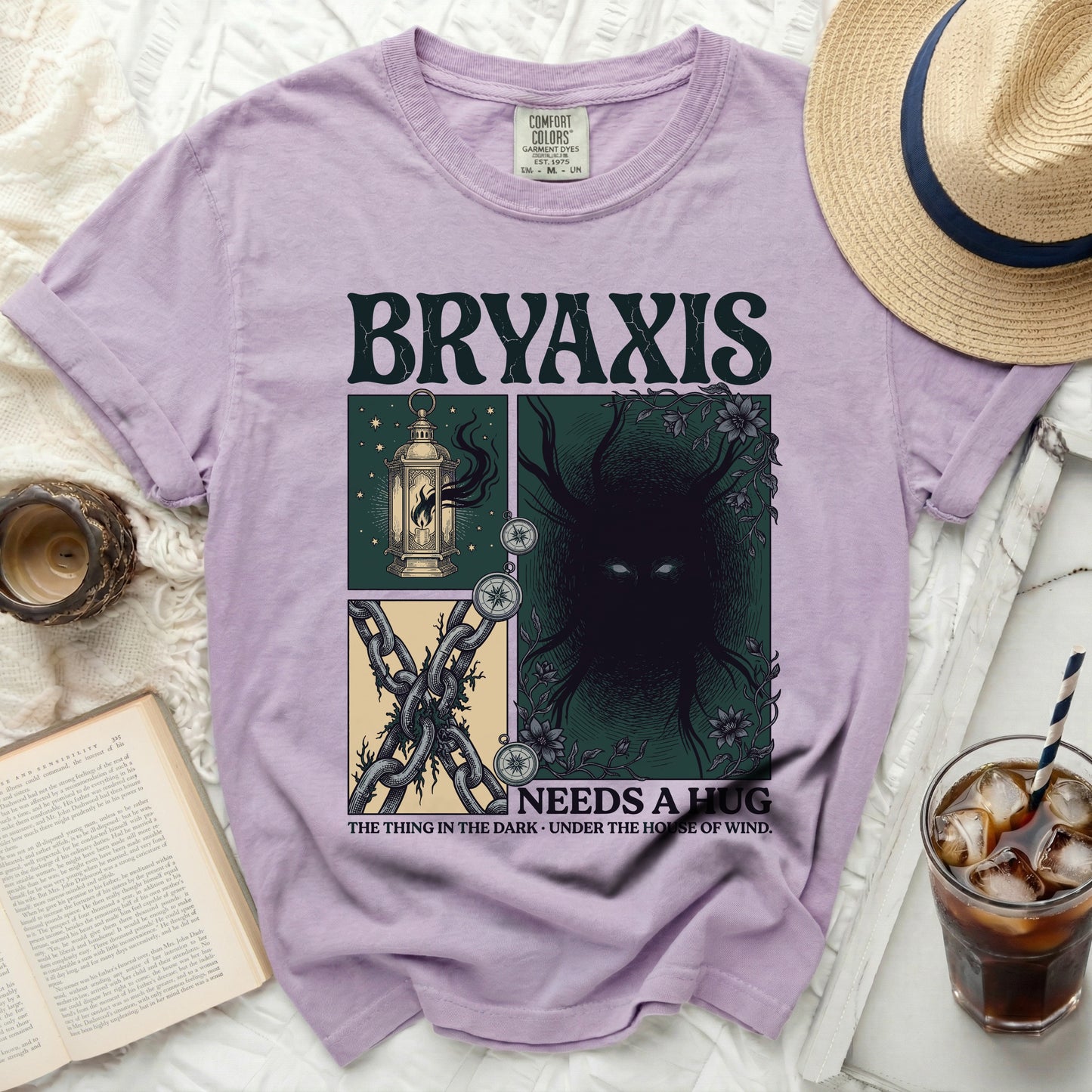 Purple t-shirt with Bryaxis "Needs a Hug" graphic, featuring lantern, chains, and creature.