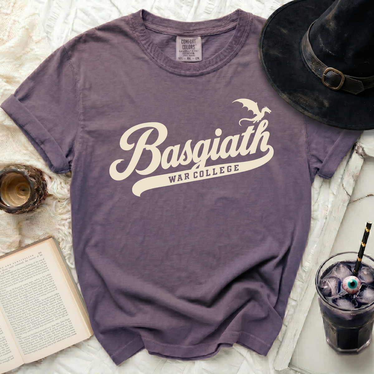 Purple t-shirt with "Basgiath War College" in cream collegiate font.