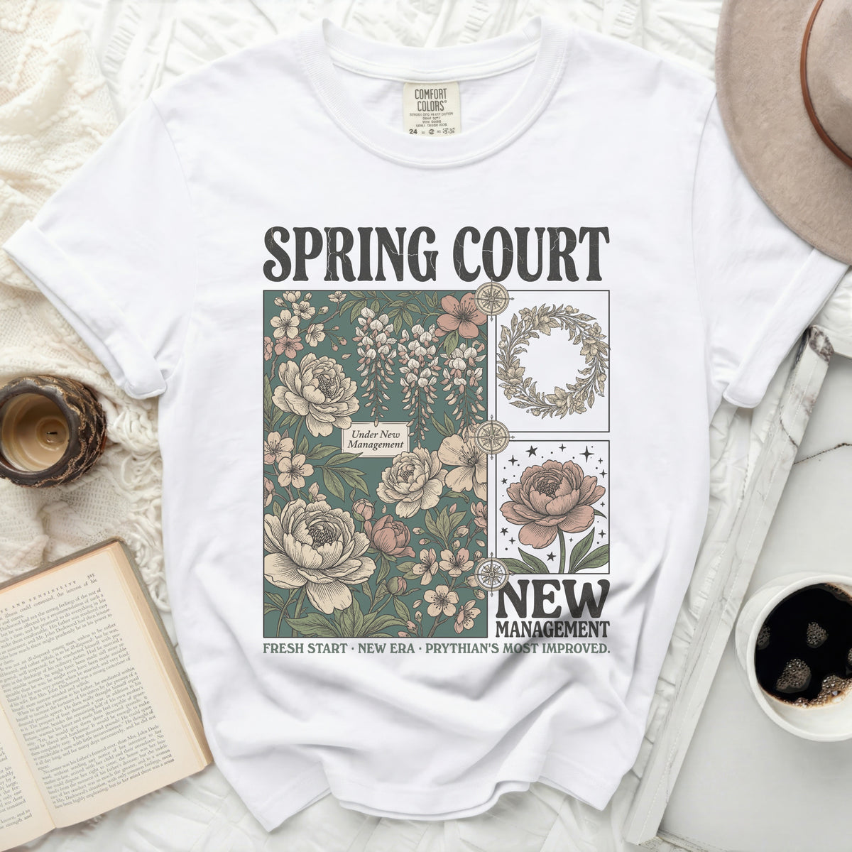 White t-shirt with "Spring Court" and floral design.