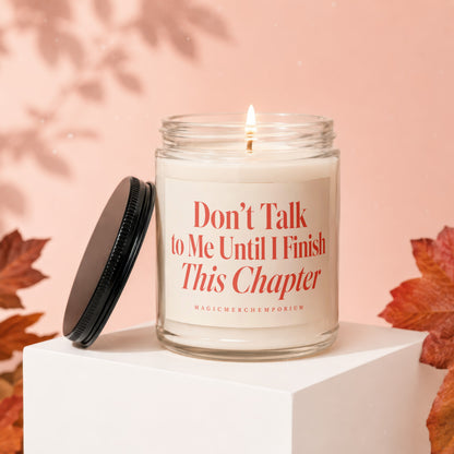 Glass candle with "Don't Talk to Me Until I Finish This Chapter" text.