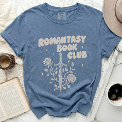 Romantasy Book Club graphic with sword, roses, and stars on blue t-shirt.