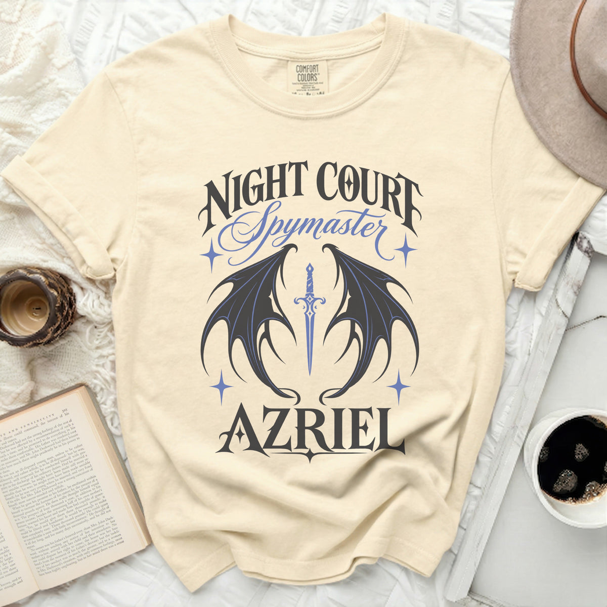 Cream t-shirt with "Night Court Spymaster Azriel" text and wings graphic.