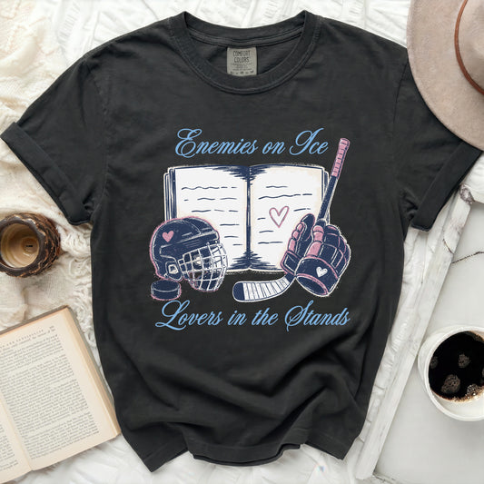 Black t-shirt with "Enemies on Ice Lovers in the Stands" text and hockey graphics.