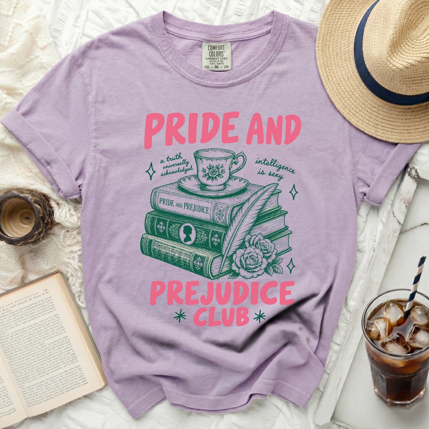 Light purple t-shirt with "Pride and Prejudice Club" design and books.