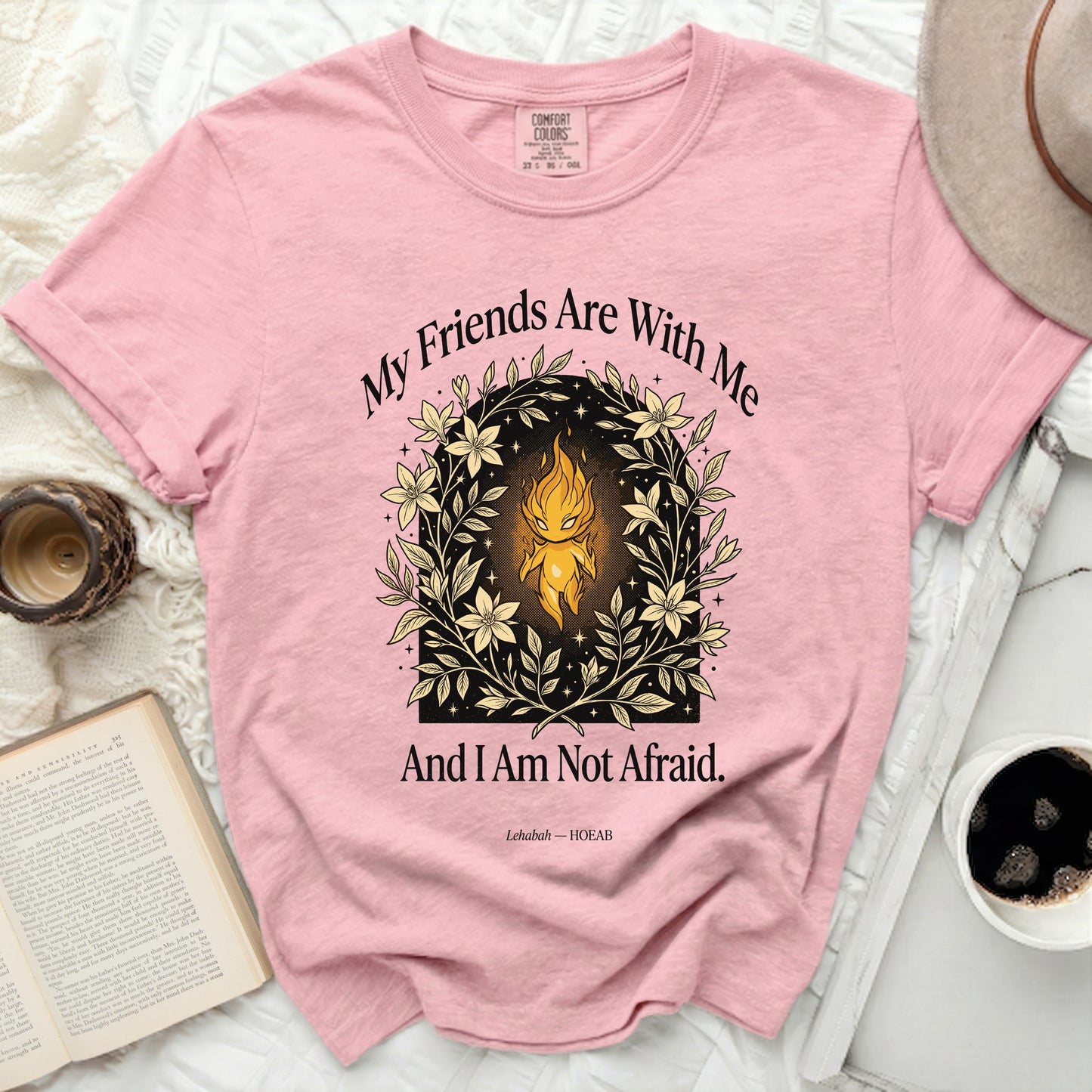 Pink t-shirt with floral wreath, flame, and text "My Friends Are With Me And I Am Not Afraid."