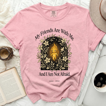 Pink t-shirt with floral wreath, flame, and text "My Friends Are With Me And I Am Not Afraid."