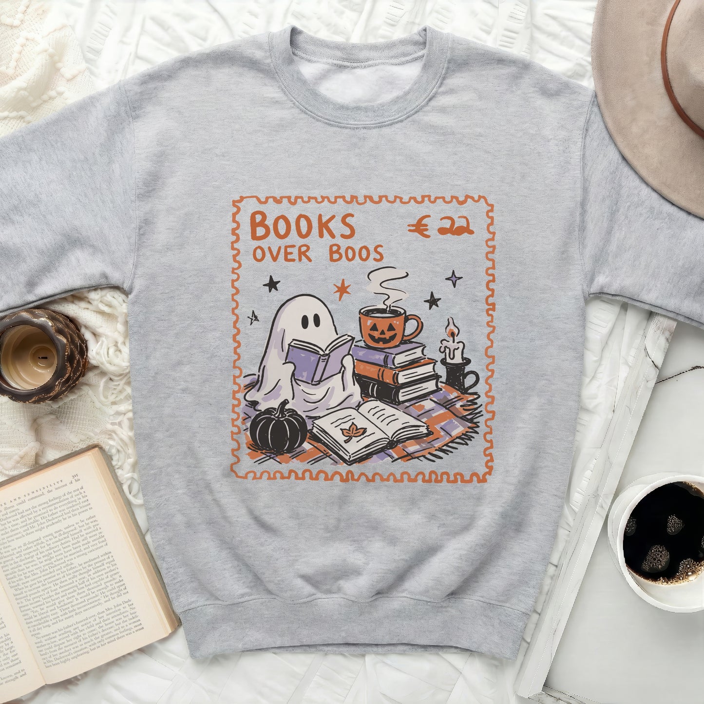 Grey sweatshirt with "Books Over Boos" and a ghost reading books.