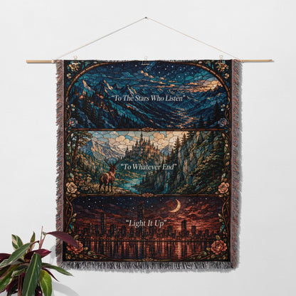 a hanging tapestry with a three-panel design, depicting a night sky, a mountain landscape, and a city skyline.
