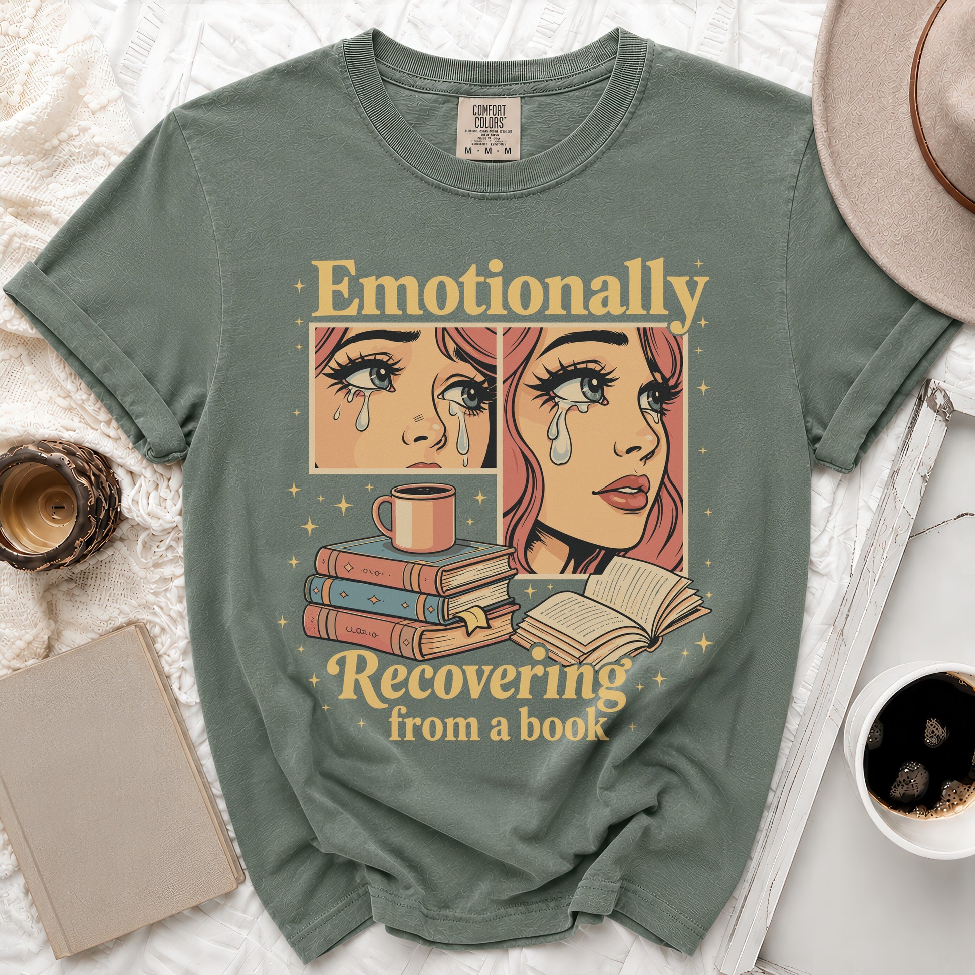 Green t-shirt with "Emotionally Recovering from a book" text and comic-style crying faces.