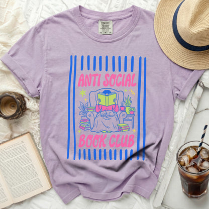 Lavender t-shirt with "ANTI SOCIAL BOOK CLUB" text and bookshelf graphic.