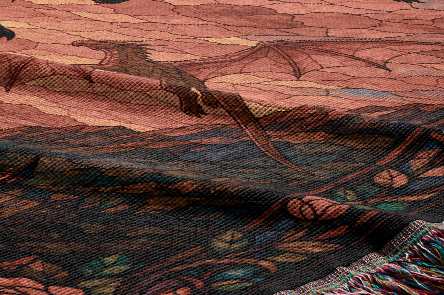 a close-up view of a dragon-themed textile, with a detailed and intricate design of a dragon and its surroundings.