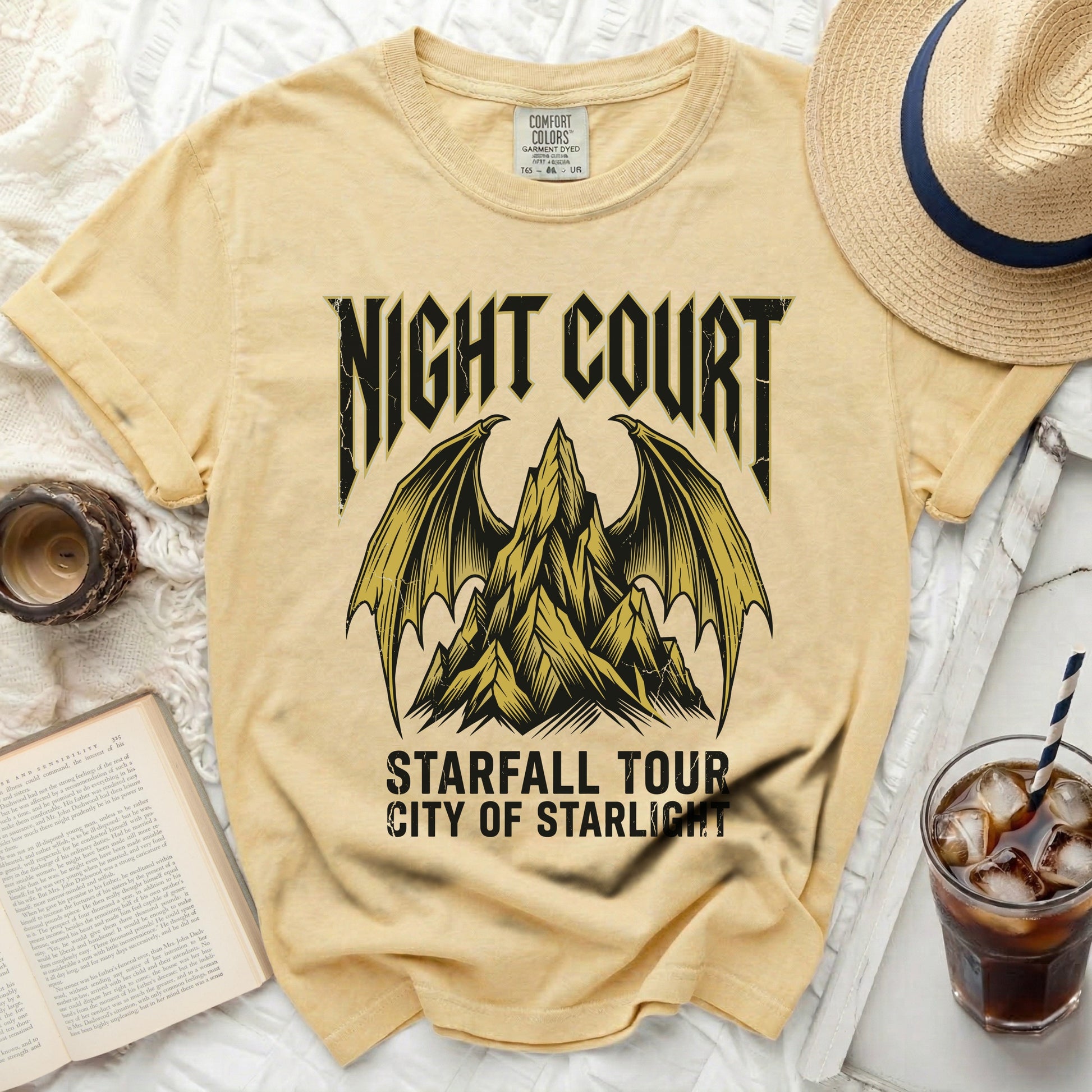 Yellow t-shirt with "NIGHT COURT STARFALL TOUR CITY OF STARLIGHT" graphic.