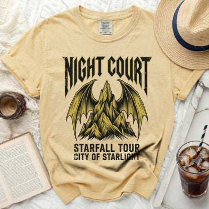 Yellow t-shirt with "NIGHT COURT STARFALL TOUR CITY OF STARLIGHT" graphic.