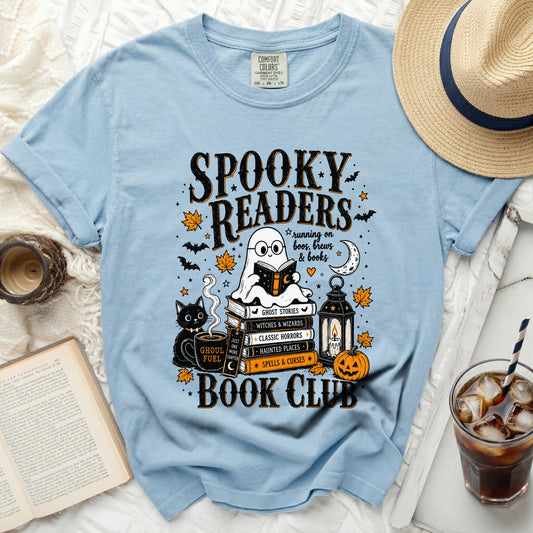 Blue t-shirt with "Spooky Readers" and book club graphics, ghost, cat, and pumpkin.