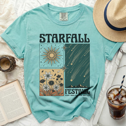 Teal t-shirt with "Starfall Festival" and celestial art.
