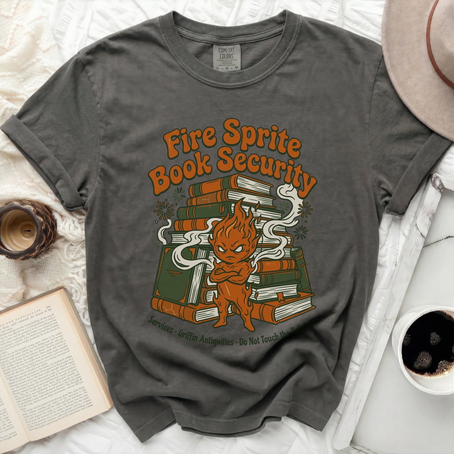 Dark gray t-shirt with a "Fire Sprite Book Security" graphic.