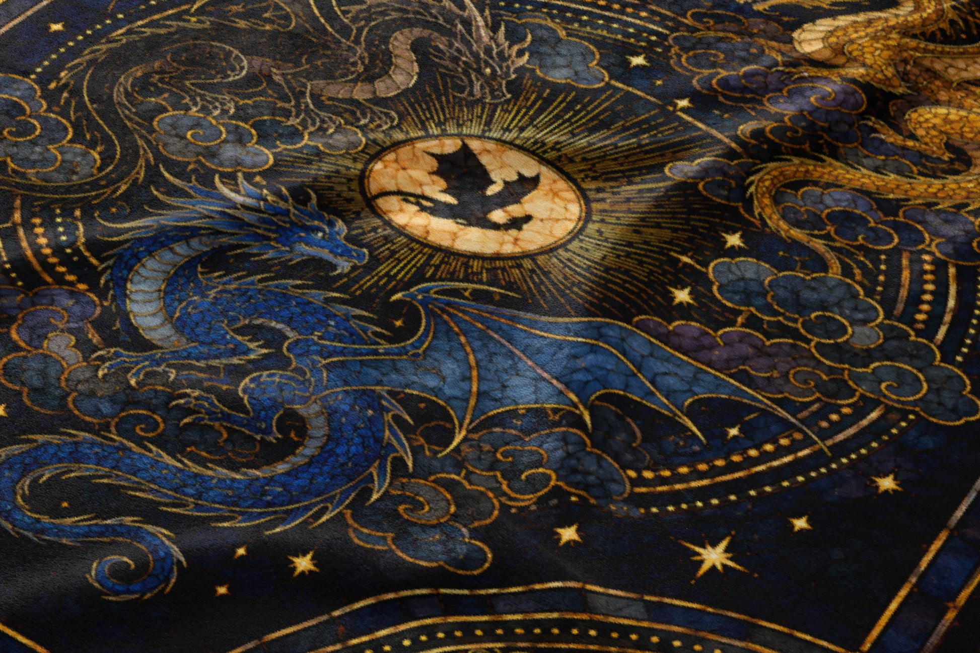 Blue and gold dragons with a stylized moon in a cloudy, starry night sky.