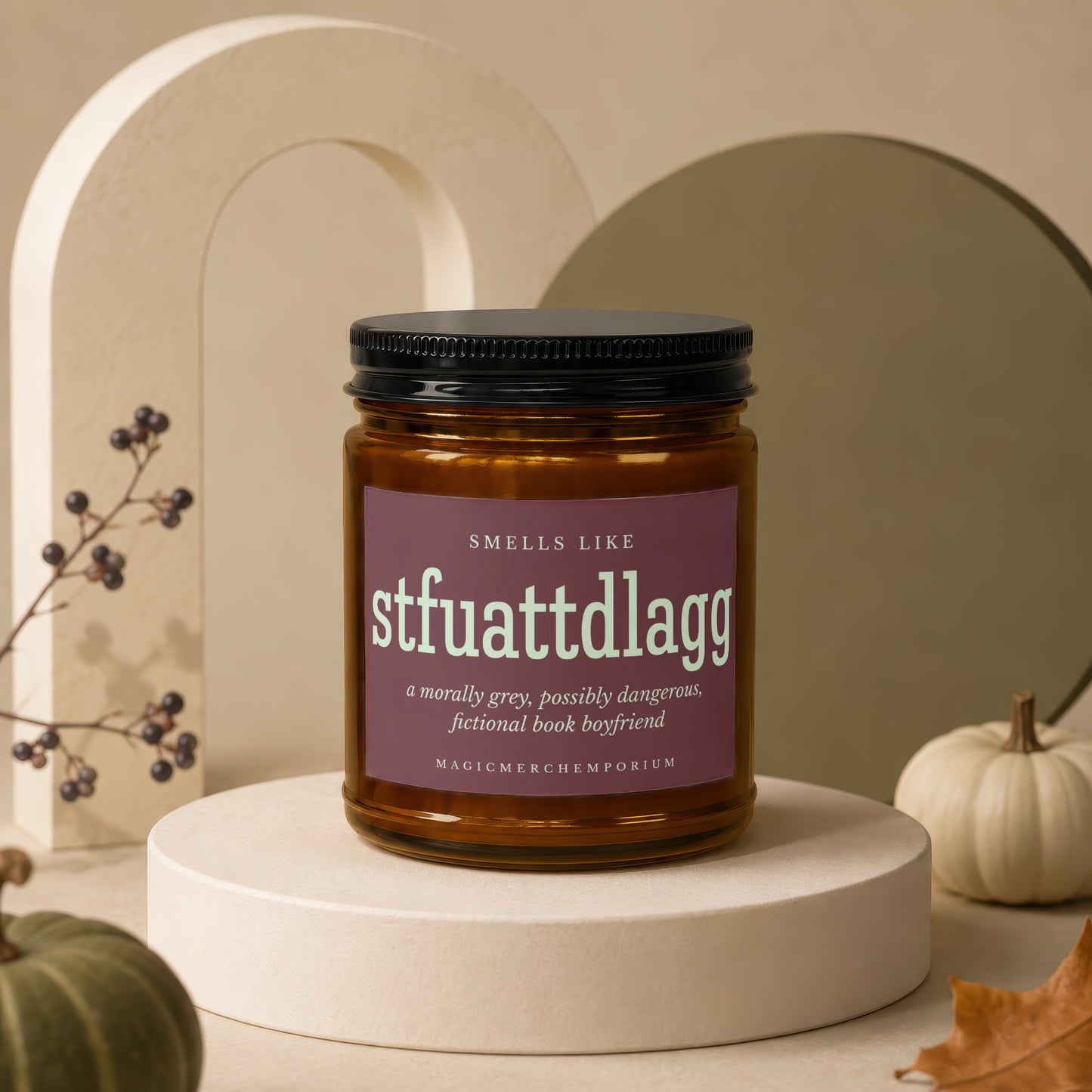 Amber glass candle with black lid, label reads "Smells Like stfuattdlagg a morally grey, possibly dangerous, fictional book boyfriend."