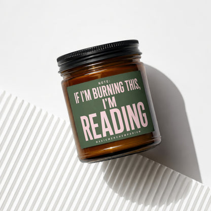 Candle with "If I'm Burning This, I'm Reading" text on label.