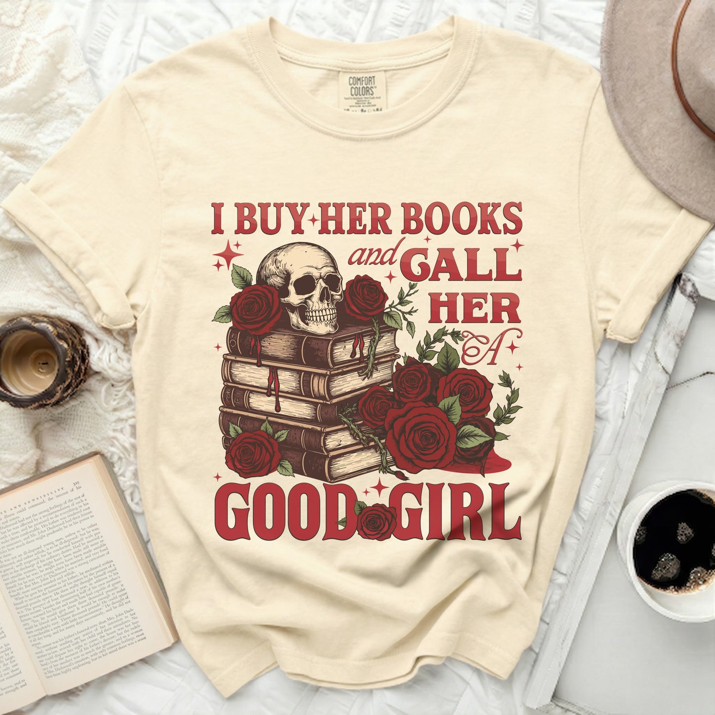 "I BUY-HER BOOKS and GALL HER A GOOD GIRL" graphic t-shirt.