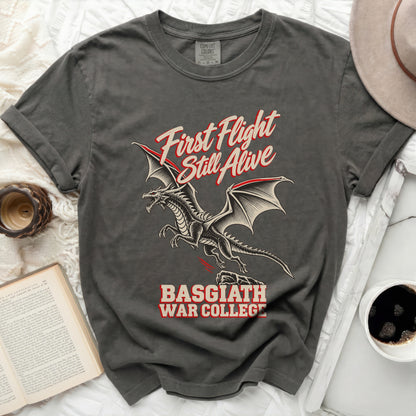 Charcoal t-shirt with dragon graphic and text "First Flight Still Alive Basgiath War College".