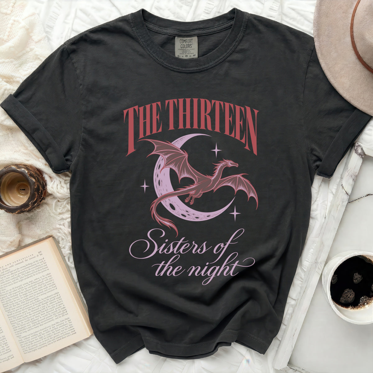 Dark grey Comfort Colors t-shirt with a dragon, moon, and "The Thirteen Sisters of the night" graphic.