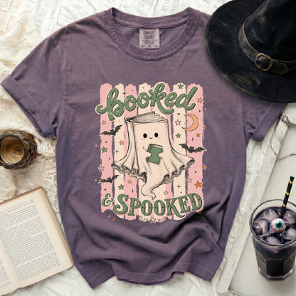 T-shirt with a book ghost and text reading "booked & SPOOKED".