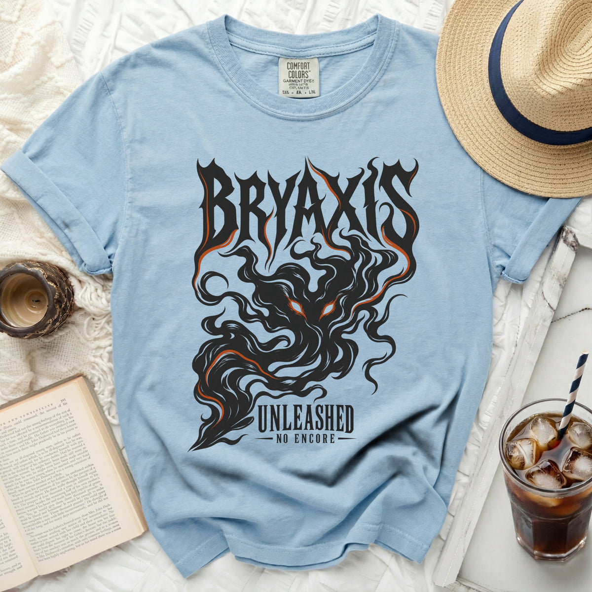Light blue Comfort Colors t-shirt with black and orange "BRYAXIS UNLEASHED NO ENCORE" graphic.