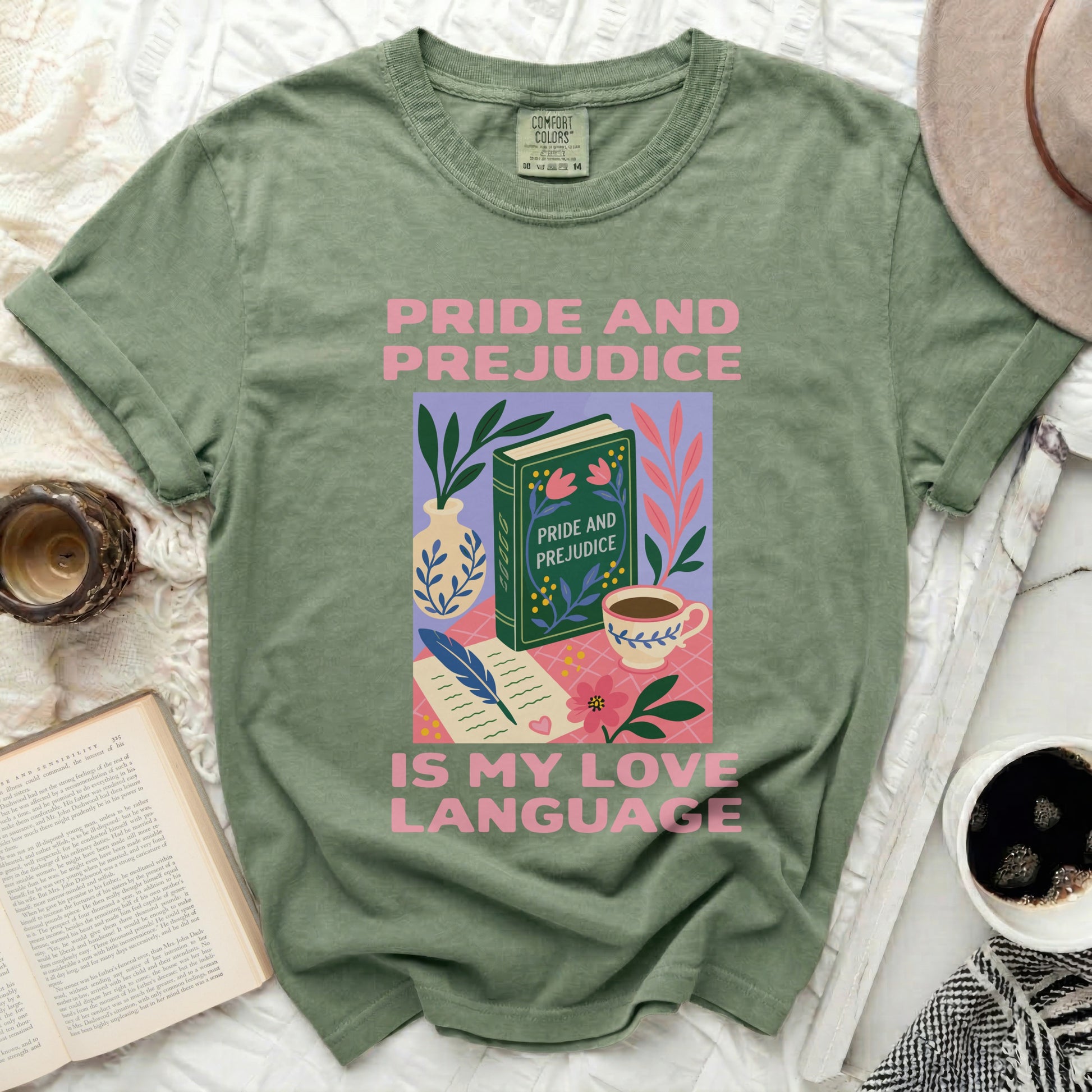 Green t-shirt with "Pride and Prejudice is my love language" graphic.