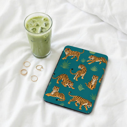 Teal protective case with a repeating tiger pattern and ice matcha latte.