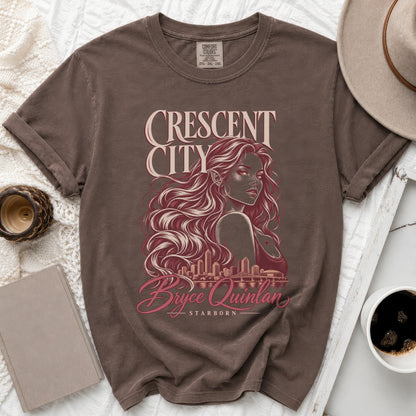Brown t-shirt with Crescent City artwork featuring Bryce Quinlan and Starborn.