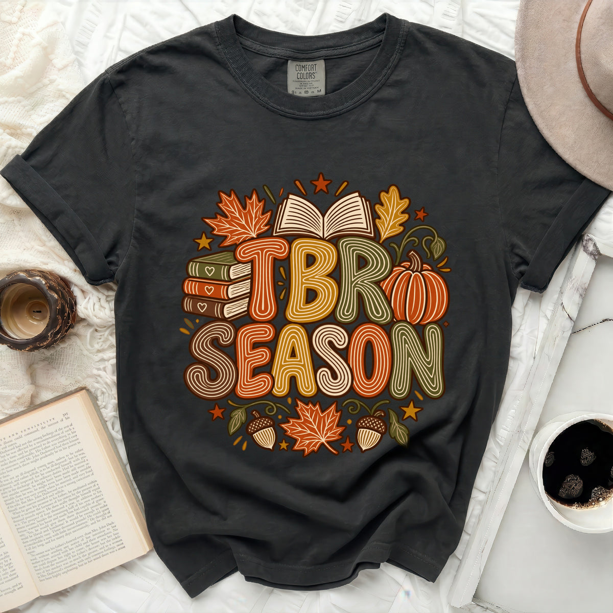 Dark grey t-shirt with "TBR SEASON" text and fall-themed graphics.