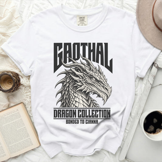 White t-shirt featuring a black dragon graphic with text "BROTHAL DRAGON COLLECTION BONDED TO CIANNA".