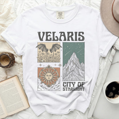 Velaris City of Starlight graphic tee with bat, sun, and mountain illustrations.