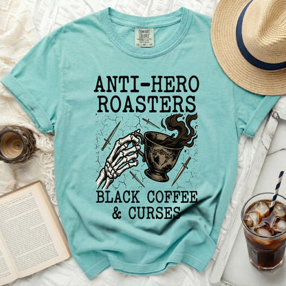 Teal t-shirt with "Anti-Hero Roasters Black Coffee & Curses" graphic.