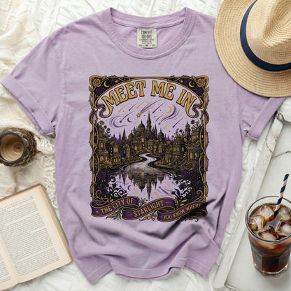 Purple t-shirt with "Meet Me In The City Of Starlight" graphic.
