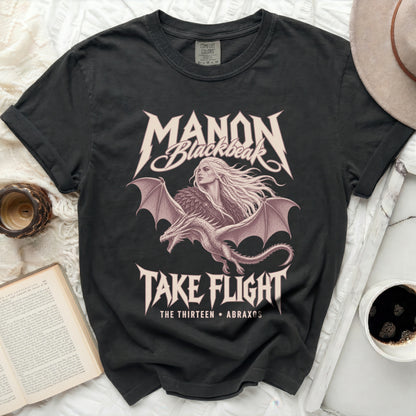 Black t-shirt with Manon Blackbeak and dragon graphic, "Take Flight" text.
