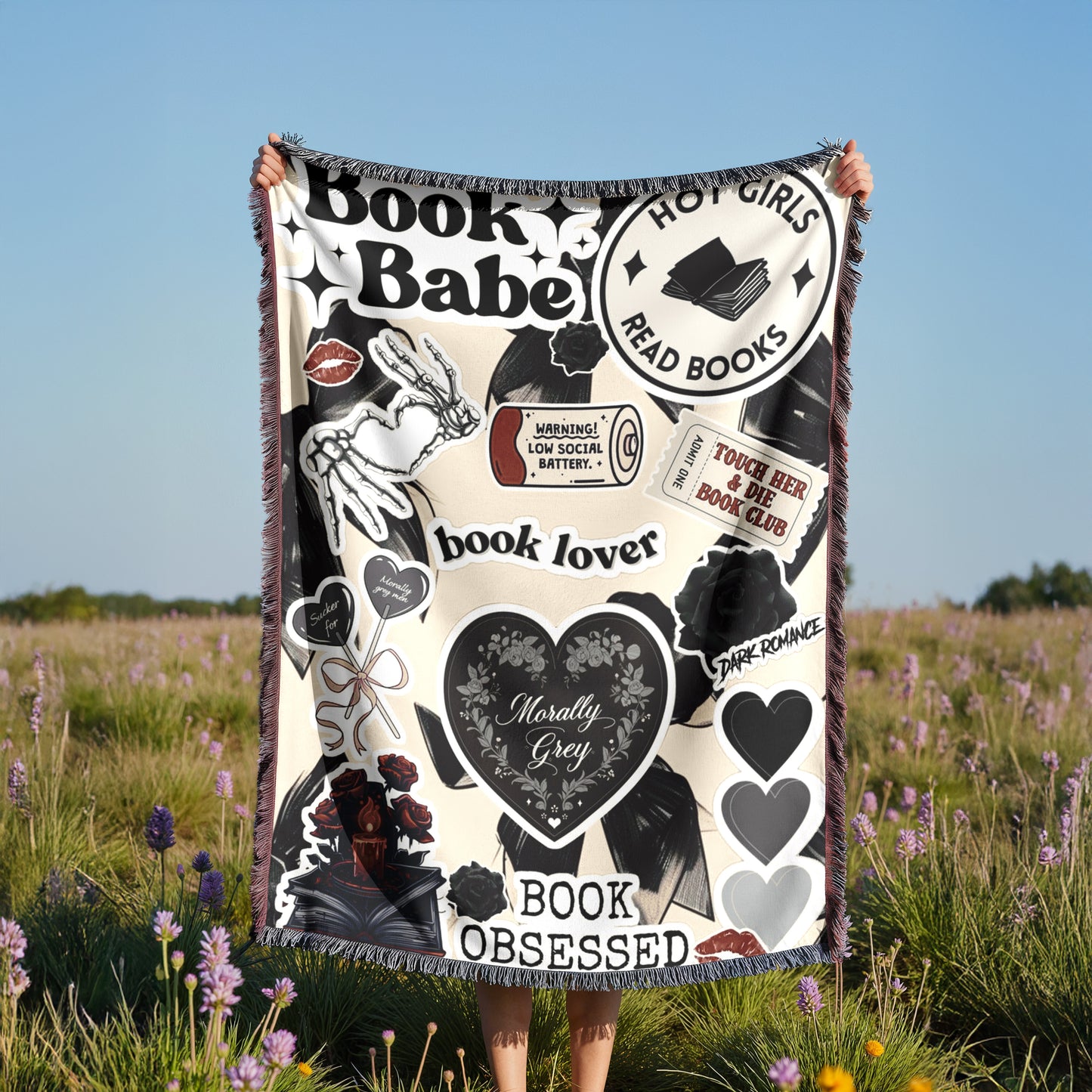 A person is holding up a blanket with various book-related designs and text, including phrases like "Book Babe", "Hot Girls Read Books", "book lover", "touch her book club", "dark romance", and "book obsessed".