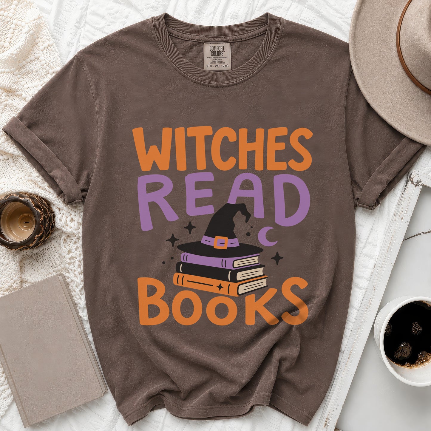 Brown t-shirt with "Witches Read Books" text and witch hat graphic.