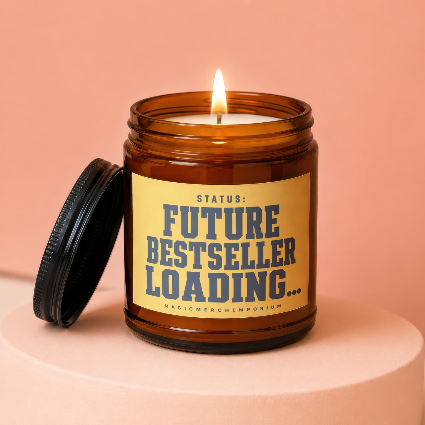 Amber candle with lit wick, black lid askew, reads "STATUS: FUTURE BESTSELLER LOADING...".