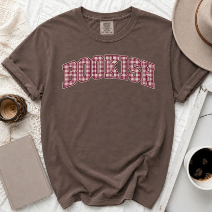 Brown t-shirt with "BOOKISH" in a burgundy plaid pattern across the chest.