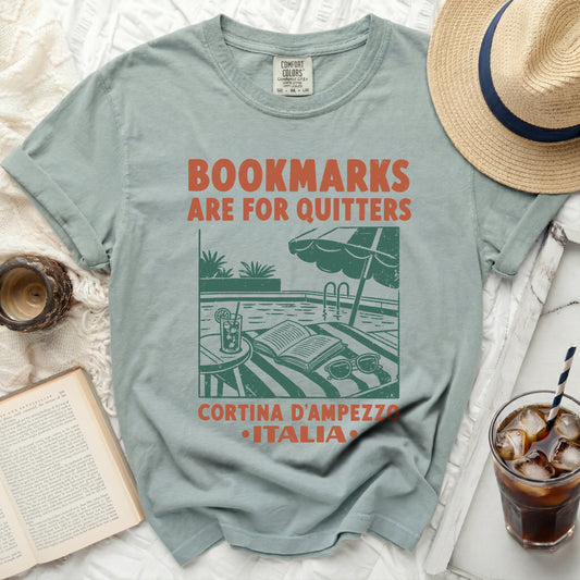 T-shirt with "BOOKMARKS ARE FOR QUITTERS" and Italy graphic.
